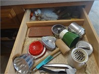 Kitchen drawer:  cookie cutters, jello molds,