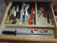 Kitchen drawer:  knives, steel, etc.