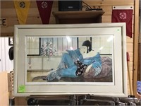 Signed oriental wall painting in glass frame