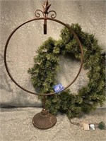 (I) Wreath stand with wreath.