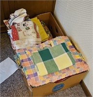 2 BOXES OF PLACEMATS, TABLE CLOTHES, TOWELS