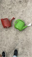 2- watering cans.