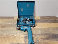 Makita Drill with Battery and Charger.