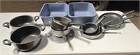 2 plastic tubs & "wearever"& other unmarked pans