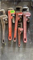 Five pipe wrenches