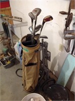 Old golf club set on cart