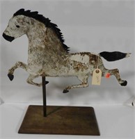 Primitive tin folk art style horse on pedestal