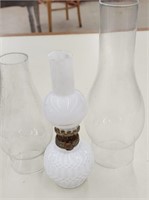 Milk glass oil lamp (8")and globes