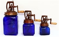 Trio blue glass butter churns