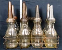 Lot of 8 vintage oil bottles w/ rack