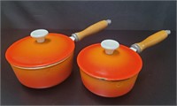 2 Orange Enameled Orange Cast-Iron Pots
