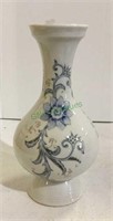 Beautiful vase with wispy floral motif measuring