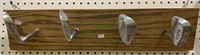 Golf club head hat rack or coat rack attached to