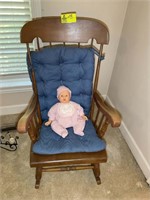 WOODEN ROCKER WITH BLUE CUSHION  APPROX 23 IN W X