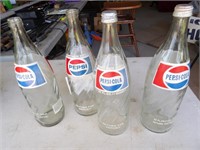 4) 32 oz Pepsi bottles