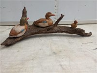 Carved Mallard Ducks On Wood Log