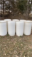 7 Plastic 35 Gallon Barrels