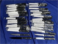 Bundle of 34 steak knives