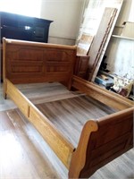 Brown wood queen size bed