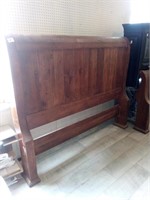 Brown wood queen bed- headboard and footboard