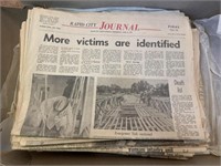 Box of newspapers from the Rapid City flood