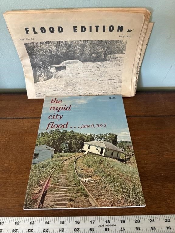 Rapid City flood book and newspaper