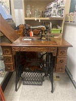 Singer Treadle sewing machine cabinet table.