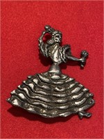 Sterling silver dancing lady pin. With maracas in