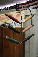 6 ANTIQUE  SPOOLS OF THREAD ON A HANGER