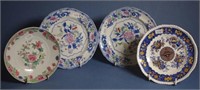 Four various Spode floral decorated side plates