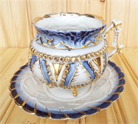Antique Victorian cup and saucer. Cup 3.75" tall.