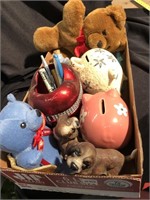 Box with piggy banks bears, dogs and a pen holder