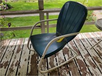 Blue clamshell rocking chair