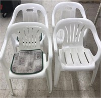 Lot of 4 plastic patio chairs 2 with pads