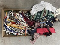 Flat of advertising pencils and men's ties.