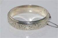 Hallmarked sterling silver hinged bangle