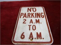 Metal sign. Embossed street NO PARKING.