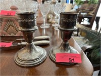 PAIR OF STERLING SILVER WEIGHTED CANDLESTICKS