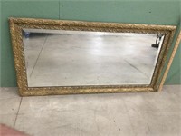 Beveled mirror in frame