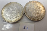 2 - 1885-O Morgan silver dollars