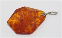 Amber pendant with sun spangles
