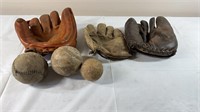 Vintage baseball mitts and balls