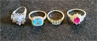 (4) Rings Marked .925 W/ Topaz & Sapphire