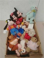Group of stuffed toys includes Disney, Ty and