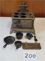 Model cast iron stove