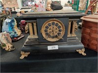 Antique mantle clock with pendulum and key
