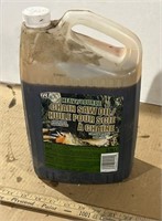 Near Full Jug of Chainsaw Oil