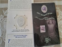 Haunted coin/stamp set, first man in space