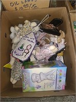 Box with welcome sign, garden fairy, dolls and