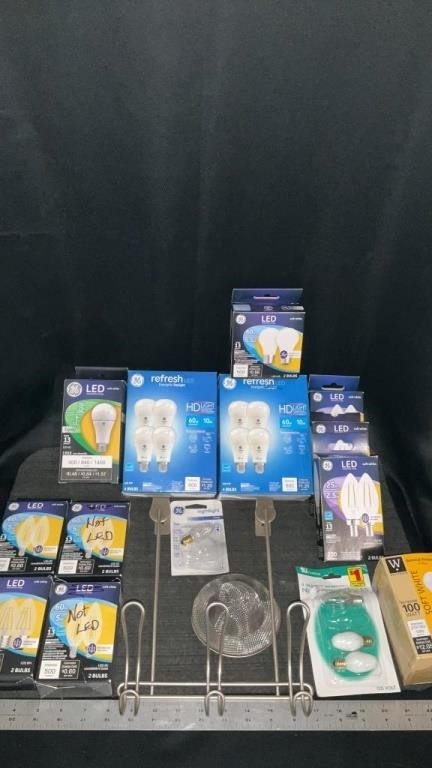 Various light bulbs, not verified, over the door
